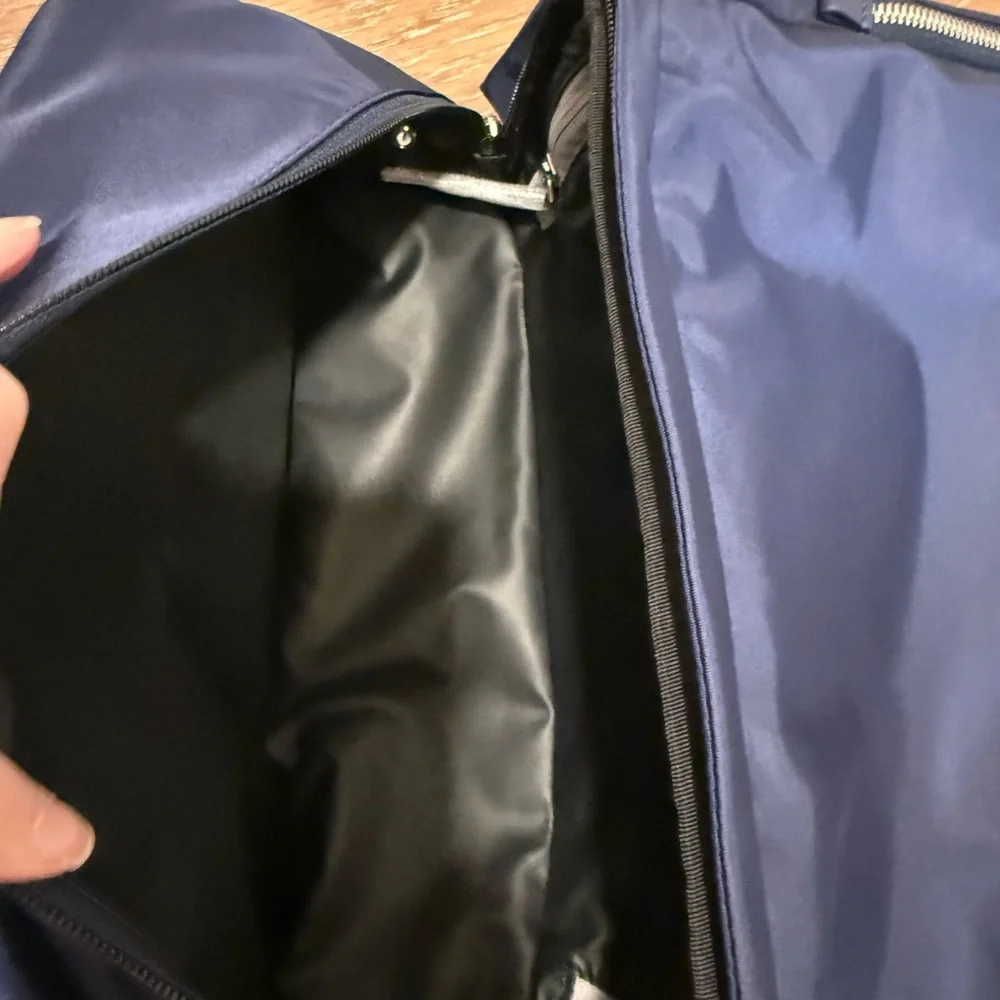 Tumi Baxley Navy Backpack with Silver Hardware Bottom compartment F 15” laptop